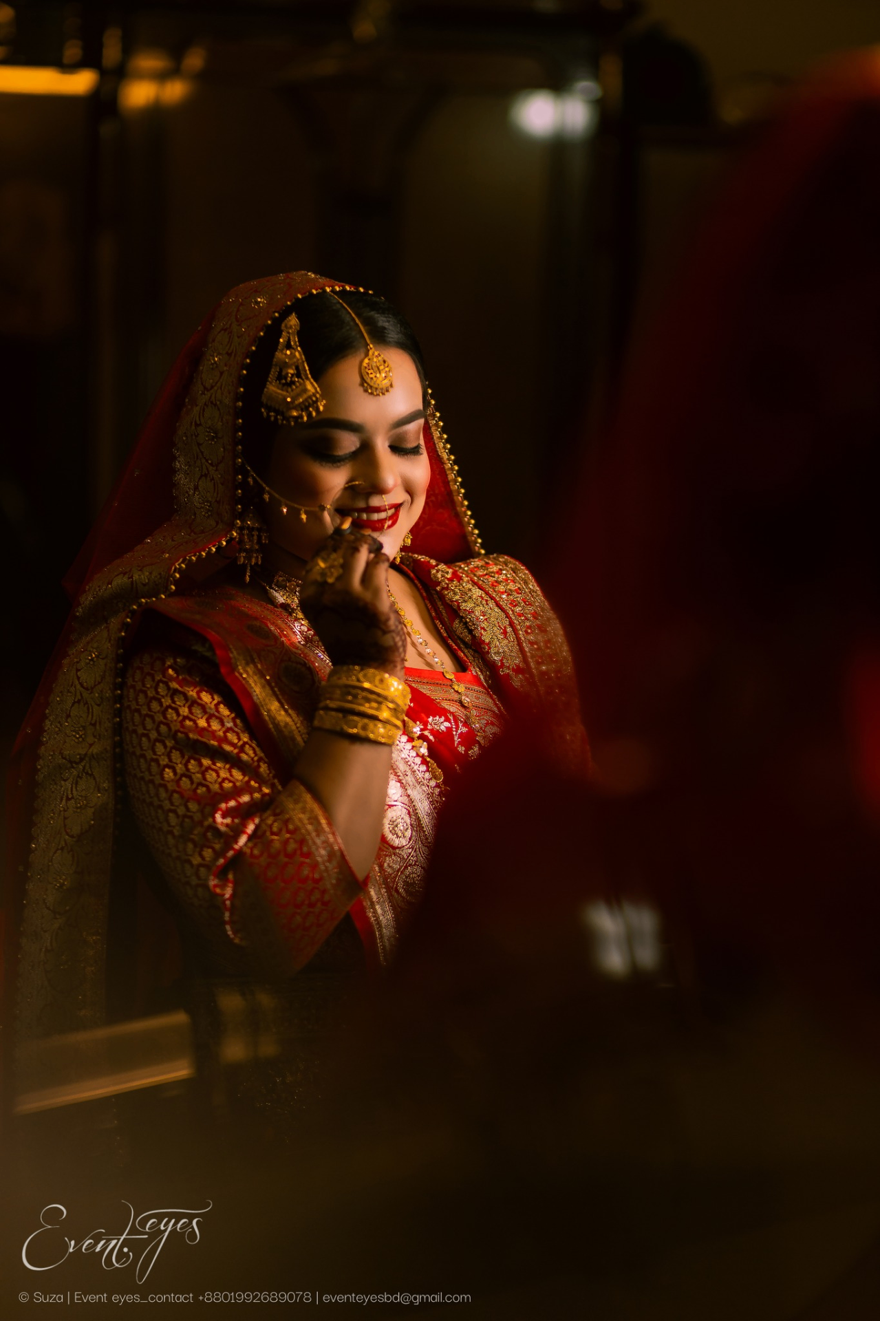 Bridal portrait in red and gold